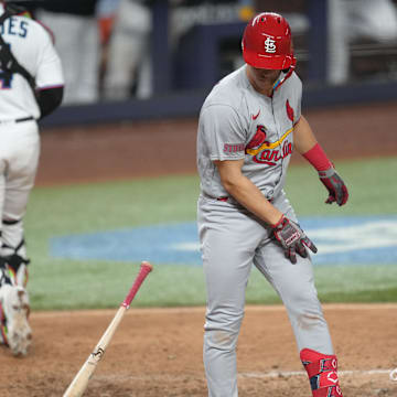 Jul 3, 2023; Miami, Florida, USA;  St. Louis Cardinals second baseman Tommy Edman (19) throws his bat down after striking out in the seventh inning against the Miami Marlins at loanDepot Park. Mandatory Credit: Jim Rassol-Imagn Images