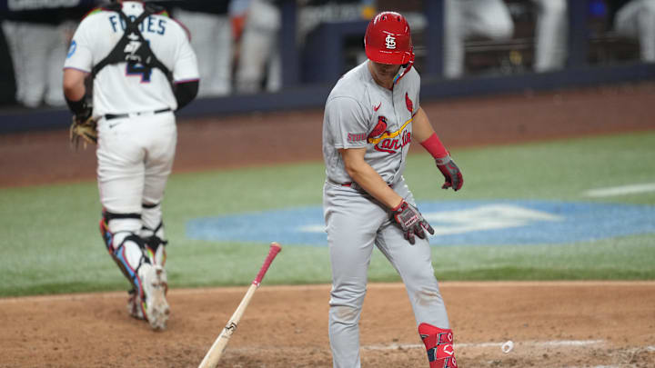 Jul 3, 2023; Miami, Florida, USA;  St. Louis Cardinals second baseman Tommy Edman (19) throws his bat down after striking out in the seventh inning against the Miami Marlins at loanDepot Park. Mandatory Credit: Jim Rassol-Imagn Images