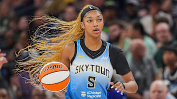 Jul 22, 2025; Minneapolis, Minnesota, USA; Chicago Sky forward Angel Reese (5) dribbles against the Minnesota Lynx in the first quarter at Target Center. Mandatory Credit: Brad Rempel-Imagn Images