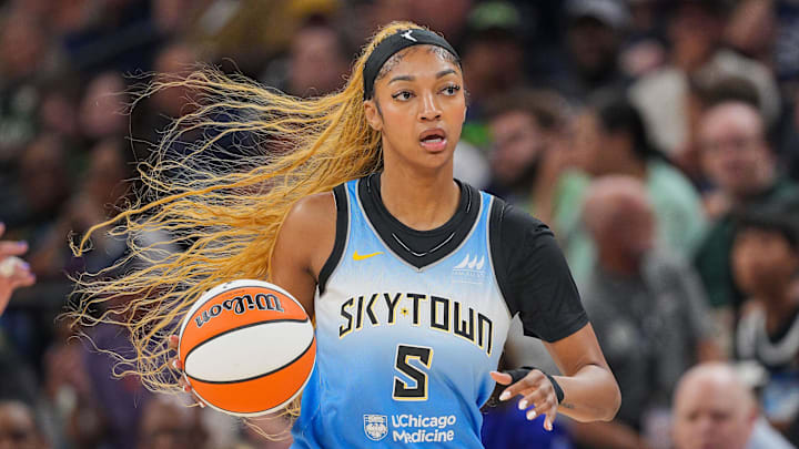 Jul 22, 2025; Minneapolis, Minnesota, USA; Chicago Sky forward Angel Reese (5) dribbles against the Minnesota Lynx in the first quarter at Target Center. Mandatory Credit: Brad Rempel-Imagn Images