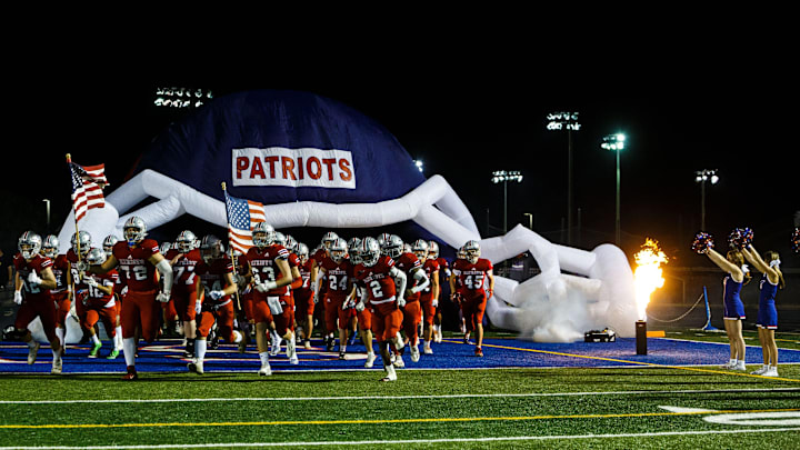 The Page Patriots exit an inflatable helmet during a playoff game in Franklin, Tenn. on Nov. 4, 2022.
Page Vs Green Hill The Page Patriots exit an inflatable helmet during a playoff game in Franklin, Tenn. on Nov. 4, 2022.
Page Vs Green Hill