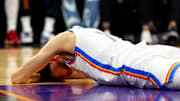 Mar 3, 2024; Phoenix, Arizona, USA; Oklahoma City Thunder forward Chet Holmgren (7) reacts to being injured during the third quarter of the game against the Phoenix Suns at Footprint Center. Mandatory Credit: Mark J. Rebilas-Imagn Images