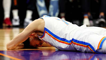 Mar 3, 2024; Phoenix, Arizona, USA; Oklahoma City Thunder forward Chet Holmgren (7) reacts to being injured during the third quarter of the game against the Phoenix Suns at Footprint Center. Mandatory Credit: Mark J. Rebilas-Imagn Images