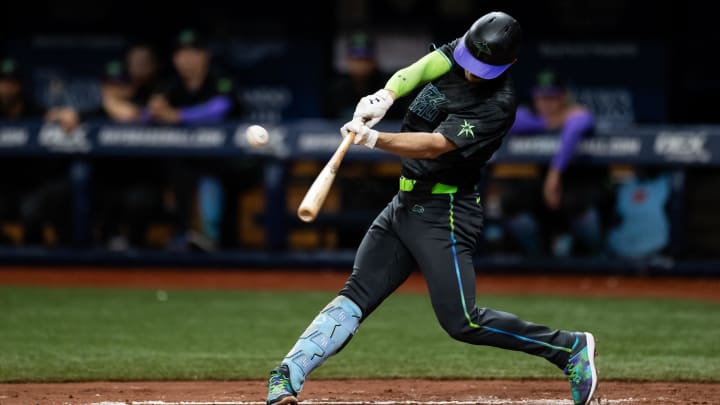 Jul 27, 2024; St. Petersburg, Florida, USA; Tampa Bay Rays second base Brandon Lowe (8) flies out to center against the Cincinnati Reds to end the third inning at Tropicana Field. Mandatory Credit: Matt Pendleton-USA TODAY Sports