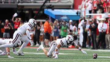 Sep 20, 2025; Salt Lake City, Utah, USA; Texas Tech Red Raiders linebacker John Curry (6) dives for a fumble by the Utah Utes during the first quarter at Rice-Eccles Stadium. Mandatory Credit: Rob Gray-Imagn Images