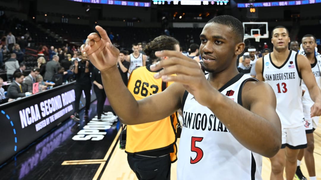 Mar 24, 2024; Spokane, WA, USA; San Diego State Aztecs guard Lamont Butler (5) celebrates after defeating the Yale Bulldogs at Spokane Veterans Memorial Arena. Mandatory Credit: James Snook-USA TODAY Sports