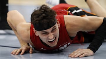 Nov 8, 2023; Memphis, Tennessee, USA; Miami Heat guard Tyler Herro (14) reacts after an injury during the first half against the Memphis Grizzlies at FedExForum. Mandatory Credit: Petre Thomas-Imagn Images