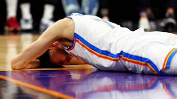 Mar 3, 2024; Phoenix, Arizona, USA; Oklahoma City Thunder forward Chet Holmgren (7) reacts to being injured during the third quarter of the game against the Phoenix Suns at Footprint Center. Mandatory Credit: Mark J. Rebilas-Imagn Images