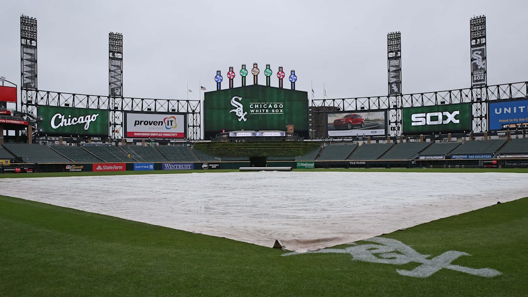 May 20, 2018; Chicago, IL, USA; A general shot of the tarp in the rain prior to a game between the Chicago White Sox and the Texas Rangers at Guaranteed Rate Field. Mandatory Credit: Dennis Wierzbicki-Imagn Images