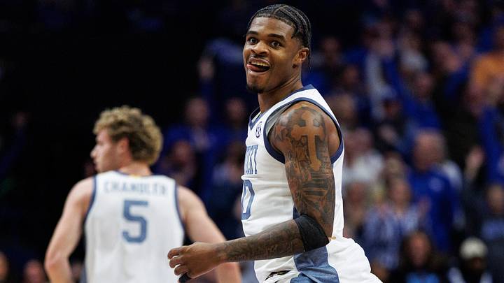 Feb 7, 2026; Lexington, Kentucky, USA; Kentucky Wildcats guard Otega Oweh (00) reacts after scoring a basket during the second half against the Tennessee Volunteers at Rupp Arena at Central Bank Center. Mandatory Credit: Jordan Prather-Imagn Images
