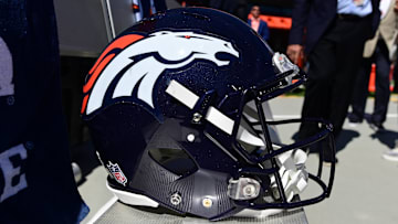 Sep 18, 2022; Denver, Colorado, USA; Detailed view of the helmet of Denver Broncos place kicker Brandon McManus (8) before the game against the Denver Broncos at Empower Field at Mile High. Mandatory Credit: Ron Chenoy-Imagn Images