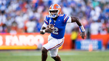 Aug 31, 2024; Gainesville, Florida, USA; Florida Gators quarterback DJ Lagway (2) runs with the ball against the Miami Hurricanes during the second half at Ben Hill Griffin Stadium. Mandatory Credit: Matt Pendleton-Imagn Images