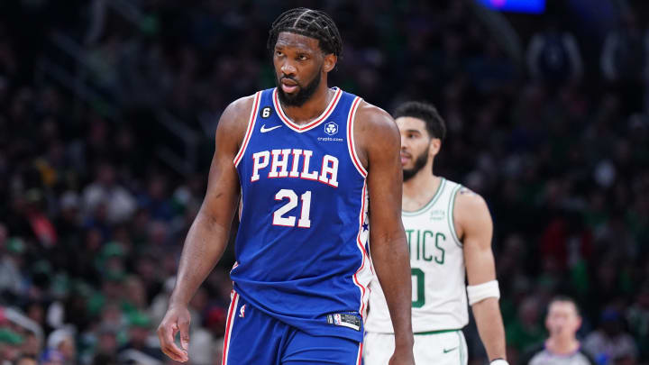 Feb 8, 2023; Boston, Massachusetts, USA; Philadelphia 76ers center Joel Embiid (21) and Boston Celtics forward Jayson Tatum (0) return up court in the second half at TD Garden. Mandatory Credit: David Butler II-USA TODAY Sports