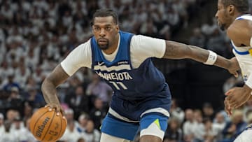 May 14, 2025; Minneapolis, Minnesota, USA; Minnesota Timberwolves center Naz Reid (11) dribbles the ball against the Golden State Warriors in the first half during game five of the second round for the 2025 NBA Playoffs at Target Center. Mandatory Credit: Jesse Johnson-Imagn Images