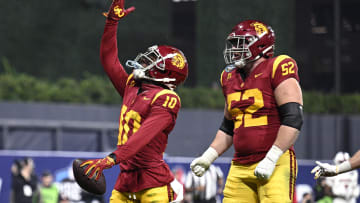 Dec 27, 2023; San Diego, CA, USA; USC Trojans wide receiver Kyron Hudson (10) celebrates after scoring a touchdown against the Louisville Cardinals during the first half at Petco Park. Mandatory Credit: Orlando Ramirez-USA TODAY Sports