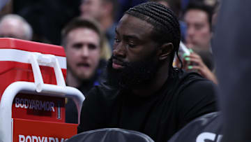 Boston Celtics guard Jaylen Brown watches the game against the Utah Jazz from the bench in street clothes during the fourth quarter at Delta Center.