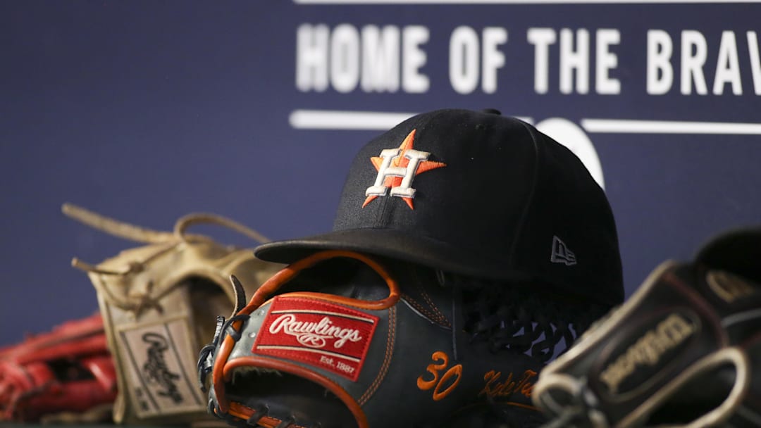 Aug 20, 2022; Atlanta, Georgia, USA; A detailed view of the hat and glove of Houston Astros right fielder Kyle Tucker (not pictured) against the Atlanta Braves in the eleventh inning at Truist Park. Aug 20, 2022; Atlanta, Georgia, USA; A detailed view of the hat and glove of Houston Astros right fielder Kyle Tucker (not pictured) against the Atlanta Braves in the eleventh inning at Truist Park.