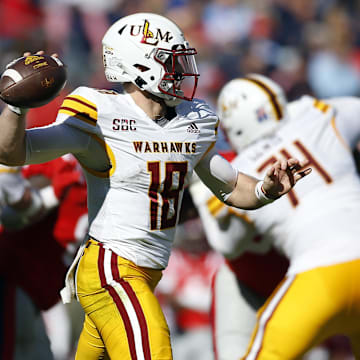 Nov 18, 2023; Oxford, Mississippi, USA; Louisiana Monroe Warhawks quarterback Jiya Wright (18) passes the ball against the Mississippi Rebels during the second half at Vaught-Hemingway Stadium. Mandatory Credit: Petre Thomas-Imagn Images