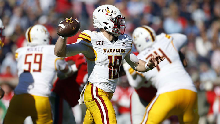 Nov 18, 2023; Oxford, Mississippi, USA; Louisiana Monroe Warhawks quarterback Jiya Wright (18) passes the ball against the Mississippi Rebels during the second half at Vaught-Hemingway Stadium. Mandatory Credit: Petre Thomas-Imagn Images