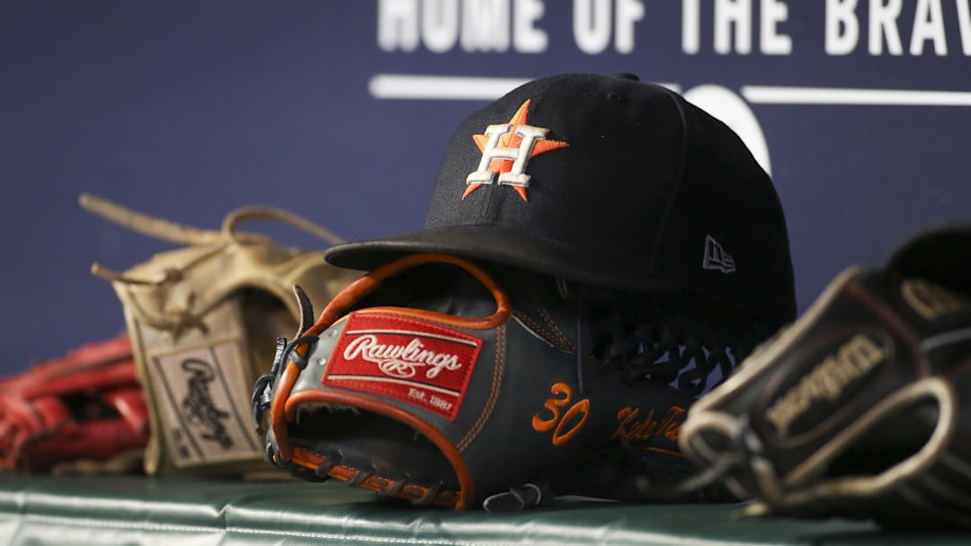 Aug 20, 2022; Atlanta, Georgia, USA; A detailed view of the hat and glove of Houston Astros right fielder Kyle Tucker (not pictured) against the Atlanta Braves in the eleventh inning at Truist Park. Aug 20, 2022; Atlanta, Georgia, USA; A detailed view of the hat and glove of Houston Astros right fielder Kyle Tucker (not pictured) against the Atlanta Braves in the eleventh inning at Truist Park.