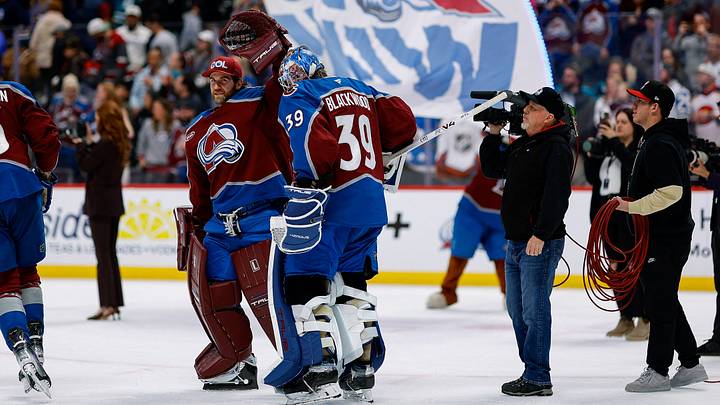 Feb 4, 2026; Denver, Colorado, USA; Colorado Avalanche goaltender MacKenzie Blackwood (39) celebrates with goaltender Scott Wedgewood (41) after the game against the San Jose Sharks at Ball Arena. Mandatory Credit: Isaiah J. Downing-Imagn Images