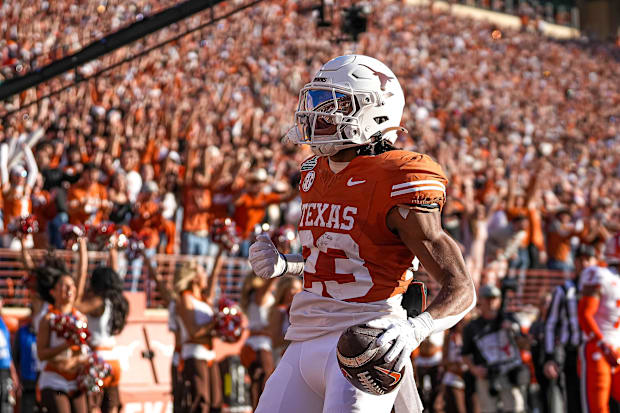 Texas Longhorns running back Jaydon Blue celebrates a touchdown against the Clemson Tigers in the College Football Playoffs.