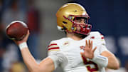 Nov 29, 2025; Syracuse, New York, USA; Boston College Eagles quarterback Dylan Lonergan (9) warms up prior to the game against the Syracuse Orange at the JMA Wireless Dome. Mandatory Credit: Rich Barnes-Imagn Images