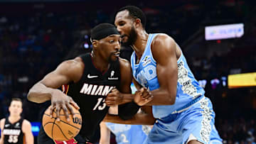 Mar 5, 2025; Cleveland, Ohio, USA; Miami Heat center Bam Adebayo (13) drives to the basket against Cleveland Cavaliers forward Evan Mobley (4) during the first half at Rocket Arena. Mandatory Credit: Ken Blaze-Imagn Images