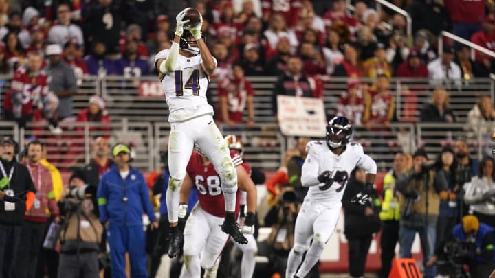 Baltimore Ravens safety Kyle Hamilton (14) intercepts a pass against the San Francisco 49ers in the second quarter at Levi's Stadium. 