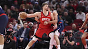 Dec 11, 2025; Houston, Texas, USA; Houston Rockets center Alperen Sengun (28) controls the ball as Los Angeles Clippers guard Bogdan Bogdanovic (10) defends during the second quarter at Toyota Center. Mandatory Credit: Troy Taormina-Imagn Images