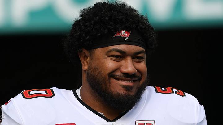 Dec 28, 2025; Miami Gardens, Florida, USA; Tampa Bay Buccaneers defensive tackle Vita Vea (50) walks out for player introductions prior to a game against the Miami Dolphins at Hard Rock Stadium. Mandatory Credit: Nathan Ray Seebeck-Imagn Images