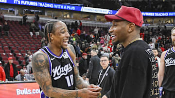 Jan 12, 2025; Chicago, Illinois, USA;  Sacramento Kings forward DeMar DeRozan (10) hugs former teammate Chicago Bulls forward Torrey Craig (13), after the game at the United Center. Mandatory Credit: Matt Marton-Imagn Images