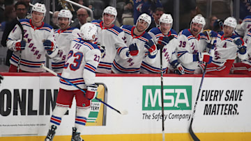 Feb 23, 2025; Pittsburgh, Pennsylvania, USA;  The New York Rangers bench congratulates defenseman Adam Fox (23) on his goal against the Pittsburgh Penguins during the third period at PPG Paints Arena. Mandatory Credit: Charles LeClaire-Imagn Images