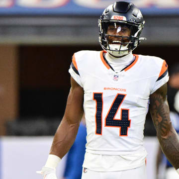 Aug 11, 2024; Indianapolis, Indiana, USA; Denver Broncos wide receiver Courtland Sutton (14) smiles during warm ups before the game against the Indianapolis Colts at Lucas Oil Stadium. Mandatory Credit: Marc Lebryk-USA TODAY Sports