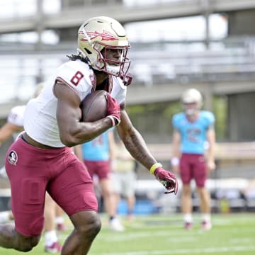 Apr 20, 2024; Tallahassee, Florida, USA; Florida State Seminoles wide receiver Hykeem Williams (8) runs the ball during the Spring Showcase at Doak S. Campbell Stadium. Mandatory Credit: Melina Myers-USA TODAY Sports