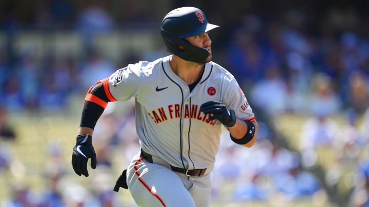 Jul 25, 2024; Los Angeles, California, USA; San Francisco Giants outfielder Michael Conforto (8) runs after hitting an RBI double against the Los Angeles Dodgers during the eighth inning at Dodger Stadium. Mandatory Credit: Gary A. Vasquez-USA TODAY Sports