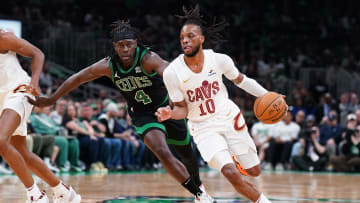 May 15, 2024; Boston, Massachusetts, USA; Cleveland Cavaliers guard Darius Garland (10) drives the ball against Boston Celtics guard Jrue Holiday (4) in the first quarter during game five of the second round for the 2024 NBA playoffs at TD Garden. Mandatory Credit: David Butler II-USA TODAY Sports