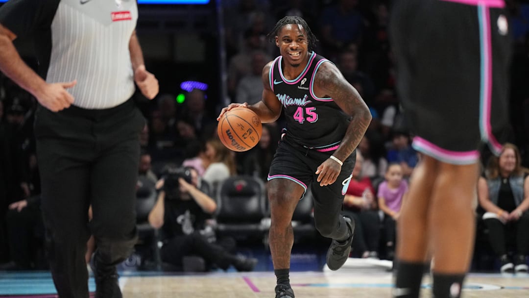Jan 4, 2026; Miami, Florida, USA;  Miami Heat guard Davion Mitchell (45) brings the ball up the court against the New Orleans Pelicans in the first half at Kaseya Center. Mandatory Credit: Jim Rassol-Imagn Images
