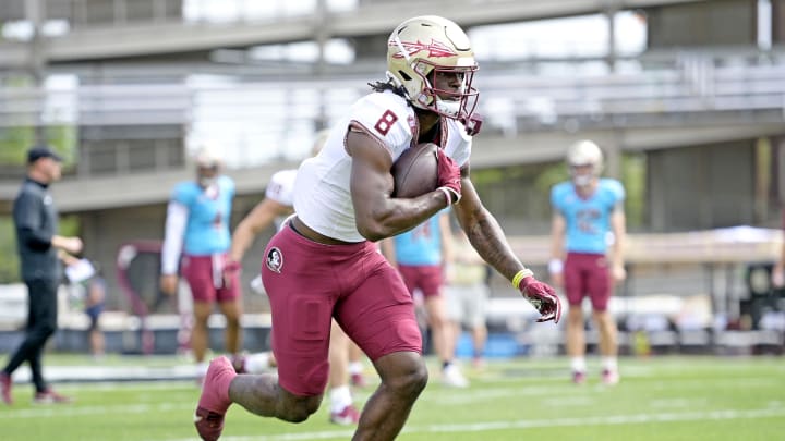 Apr 20, 2024; Tallahassee, Florida, USA; Florida State Seminoles wide receiver Hykeem Williams (8) runs the ball during the Spring Showcase at Doak S. Campbell Stadium. Mandatory Credit: Melina Myers-USA TODAY Sports