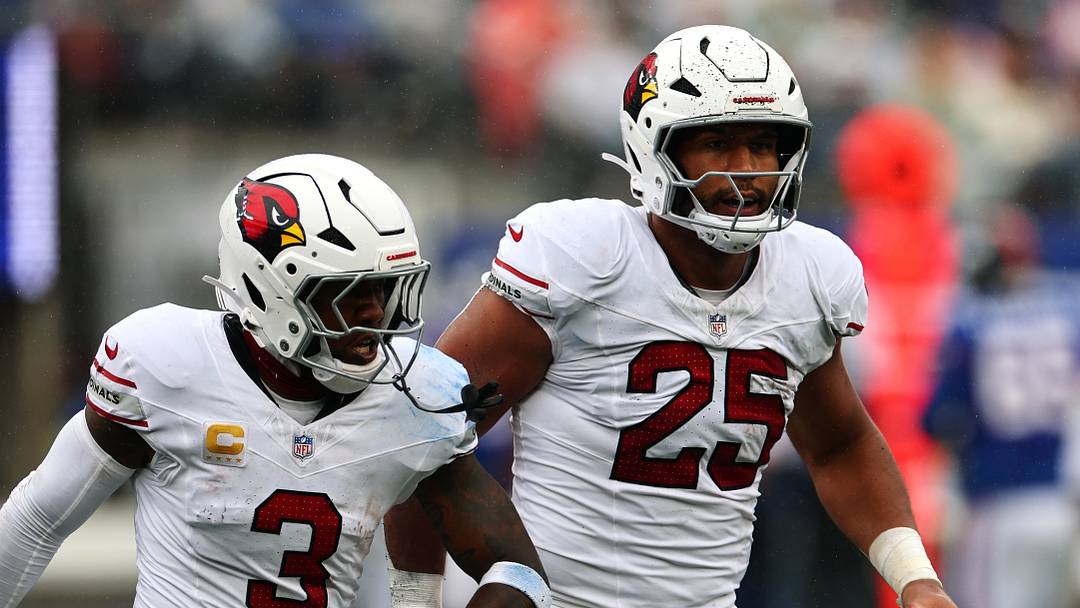 Oct 4, 2026; East Rutherford, New Jersey, USA;  Arizona Cardinals linebacker Zaven Collins (25) celebrates fumble recovery with Arizona Cardinals safety Budda Baker (3) during the fourth quarter at MetLife Stadium.  Mandatory Credit: Vincent Carchietta-Imagn Images