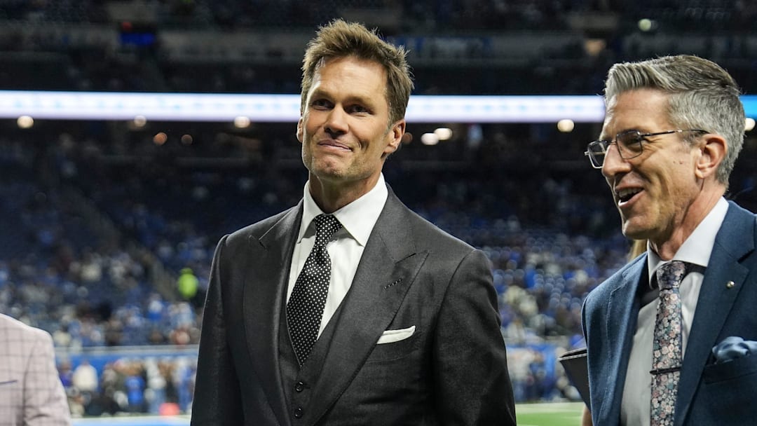 Tom Brady acknowledges fans as he walks into the tunnel before the NFC divisional round between Detroit Lions and Washington Commanders at Ford Field in Detroit on Saturday, Jan. 18, 2025.