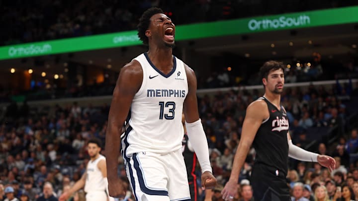 Nov 25, 2024; Memphis, Tennessee, USA; Memphis Grizzlies forward Jaren Jackson Jr. (13) reacts after a dunk during the second half against the Portland Trail Blazers at FedExForum. Mandatory Credit: Petre Thomas-Imagn Images