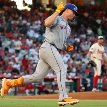 Aug 2, 2024; Anaheim, California, USA;  New York Mets first baseman Pete Alonso (20) reacts after hitting a home run against Los Angeles Angels starting pitcher Tyler Anderson (31) during the third inning at Angel Stadium. Mandatory Credit: Kiyoshi Mio-USA TODAY Sports