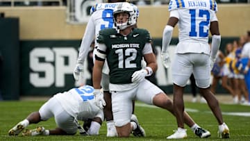 Oct 11, 2025; East Lansing, Michigan, USA; Michigan State tight end Jack Velling (12) reacts after dropping a pass against the UCLA Bruins in the fourth quarter at Spartan Stadium. Mandatory Credit: Brendan Mullin-Imagn Images