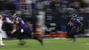 Jan 28, 2024; Baltimore, Maryland, USA; Baltimore Ravens quarterback Lamar Jackson (8) carries the