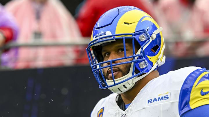 Former Los Angeles Rams defensive tackle Aaron Donald takes to the field before a game.