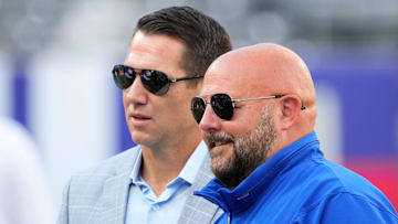 Aug 26, 2023; East Rutherford, New Jersey, USA; New York Giants head coach Brian Daboll (right) and general manager Joe Schoen (left) talk before a game against the New York Jets at MetLife Stadium. Mandatory Credit: Robert Deutsch-Imagn Images