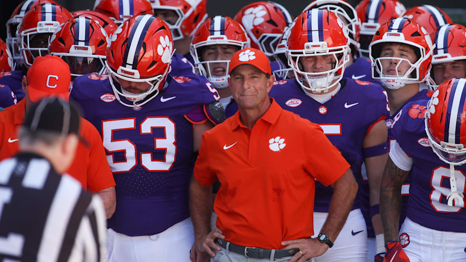 Clemson head coach Dabo Swinney prepares to run on the field with his team before a game against Georgia Tech.
