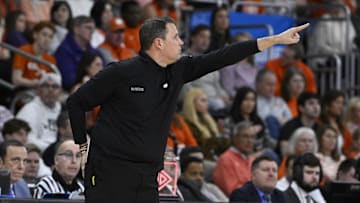 Mar 20, 2025; Providence, RI, USA; McNeese State Cowboys head coach Will Wade signals to his players  during the second half against the Clemson Tigers at Amica Mutual Pavilion. Mandatory Credit: Eric Canha-Imagn Images