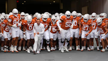 Sep 20, 2025; Austin, Texas, USA; Texas Longhorns head coach Steve Sarkisian leads his team onto the field before a game against the Sam Houston State Bearkats.
